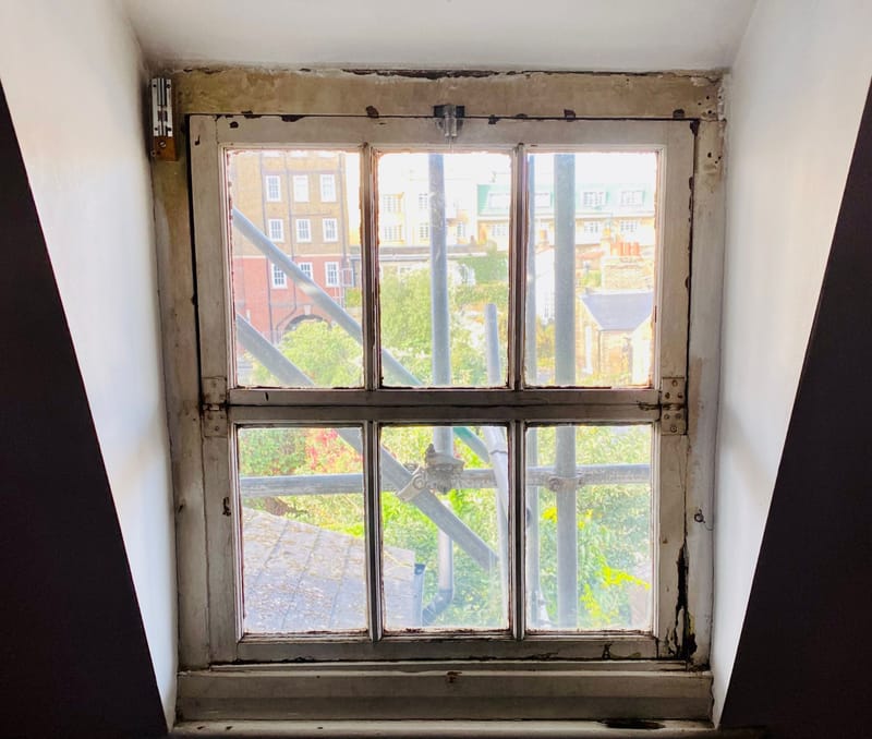 The same casement window before restoration