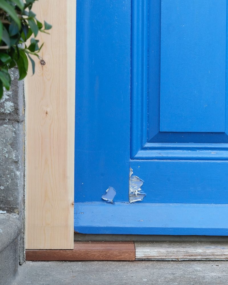 New timber spliced into the door frame full height, ready for paint