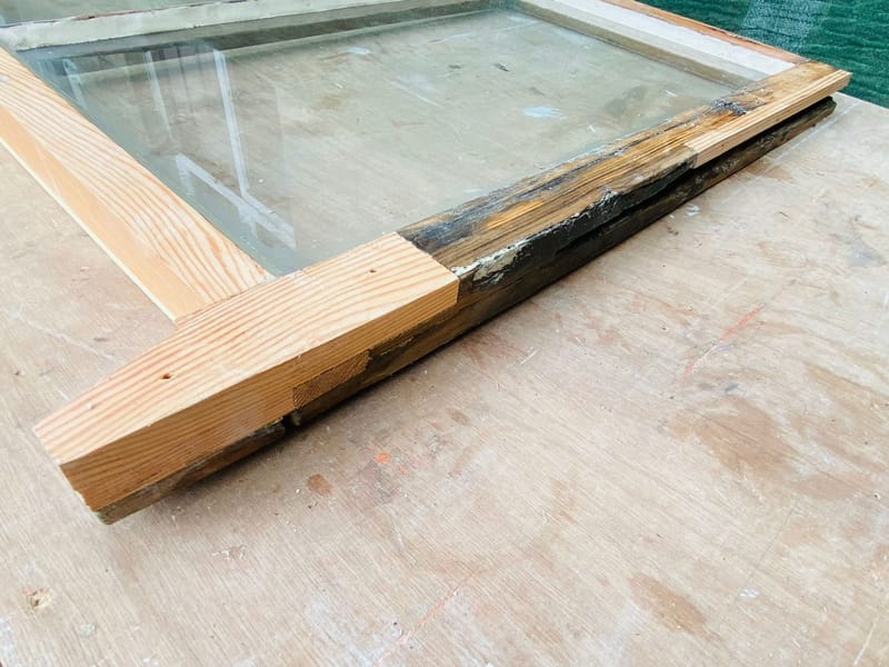 New section of timber spliced onto a rotten sash rail